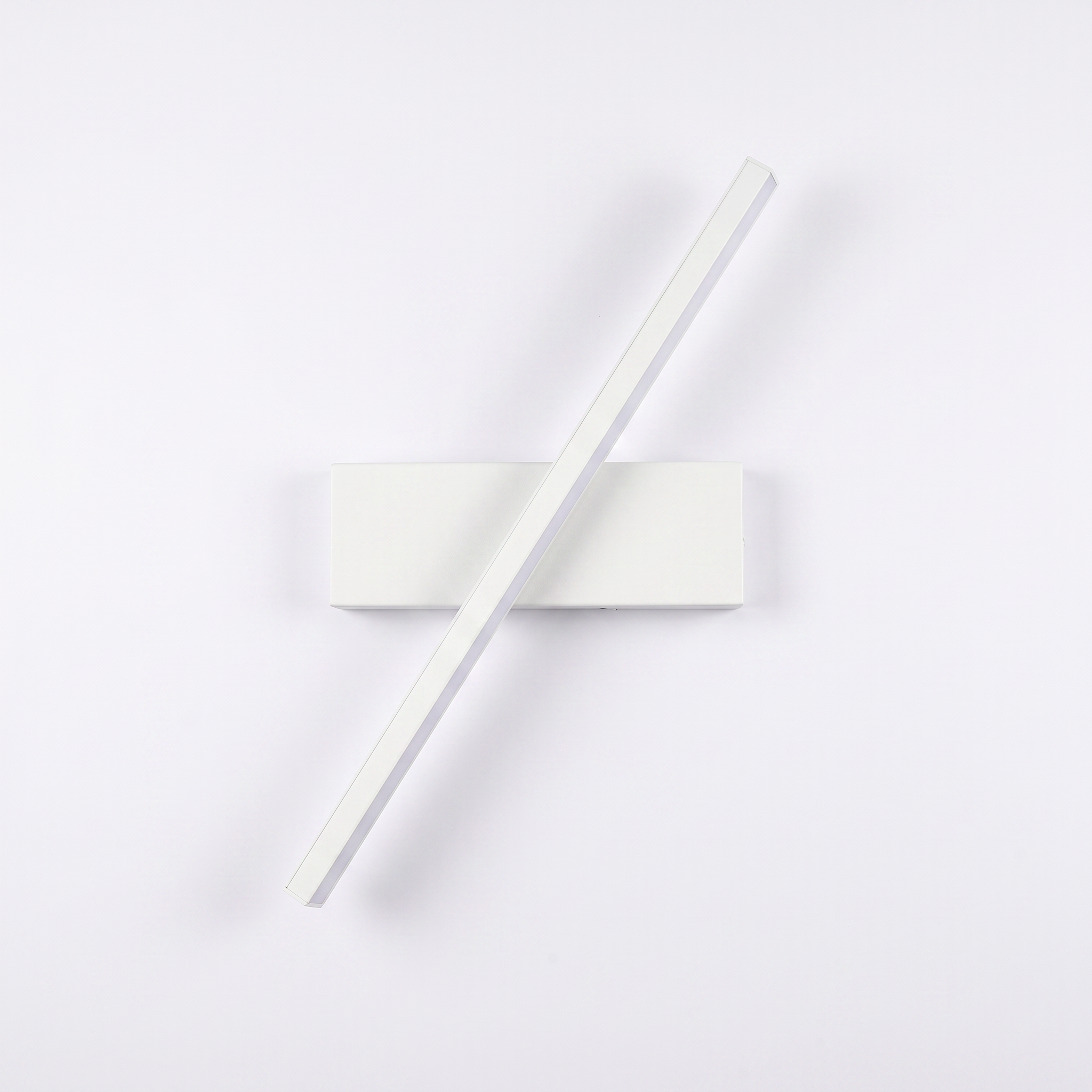 White wall sconce on a plain white background