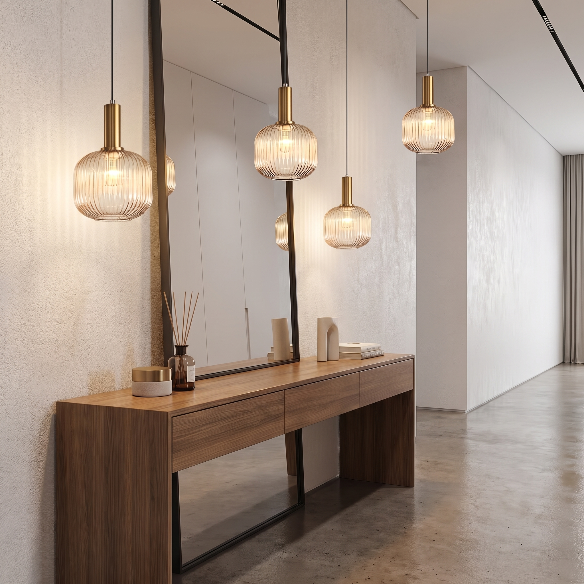 Striped glass pendant light in a hallway above a console table