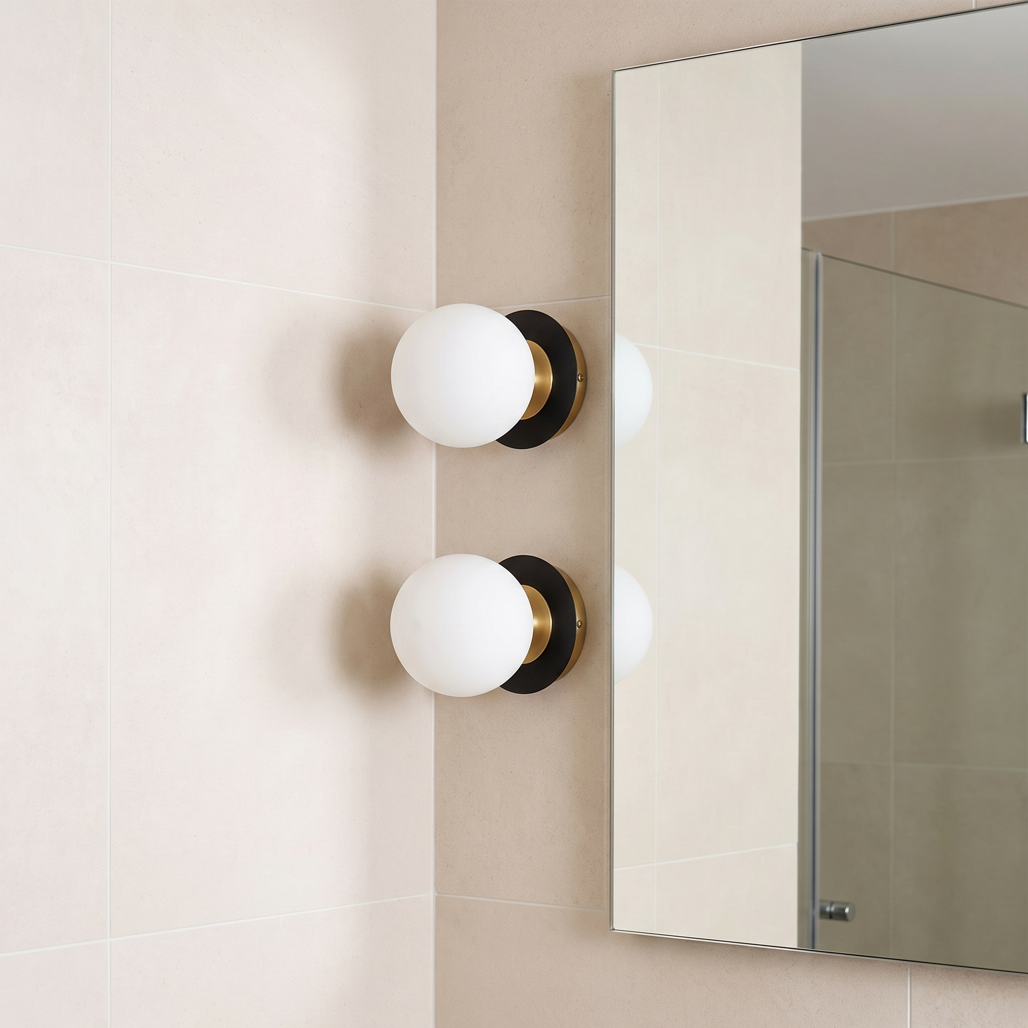 Nordic globe glass wall lamp beside a bathroom mirror