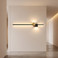 Minimalist LED wall light in a modern hallway