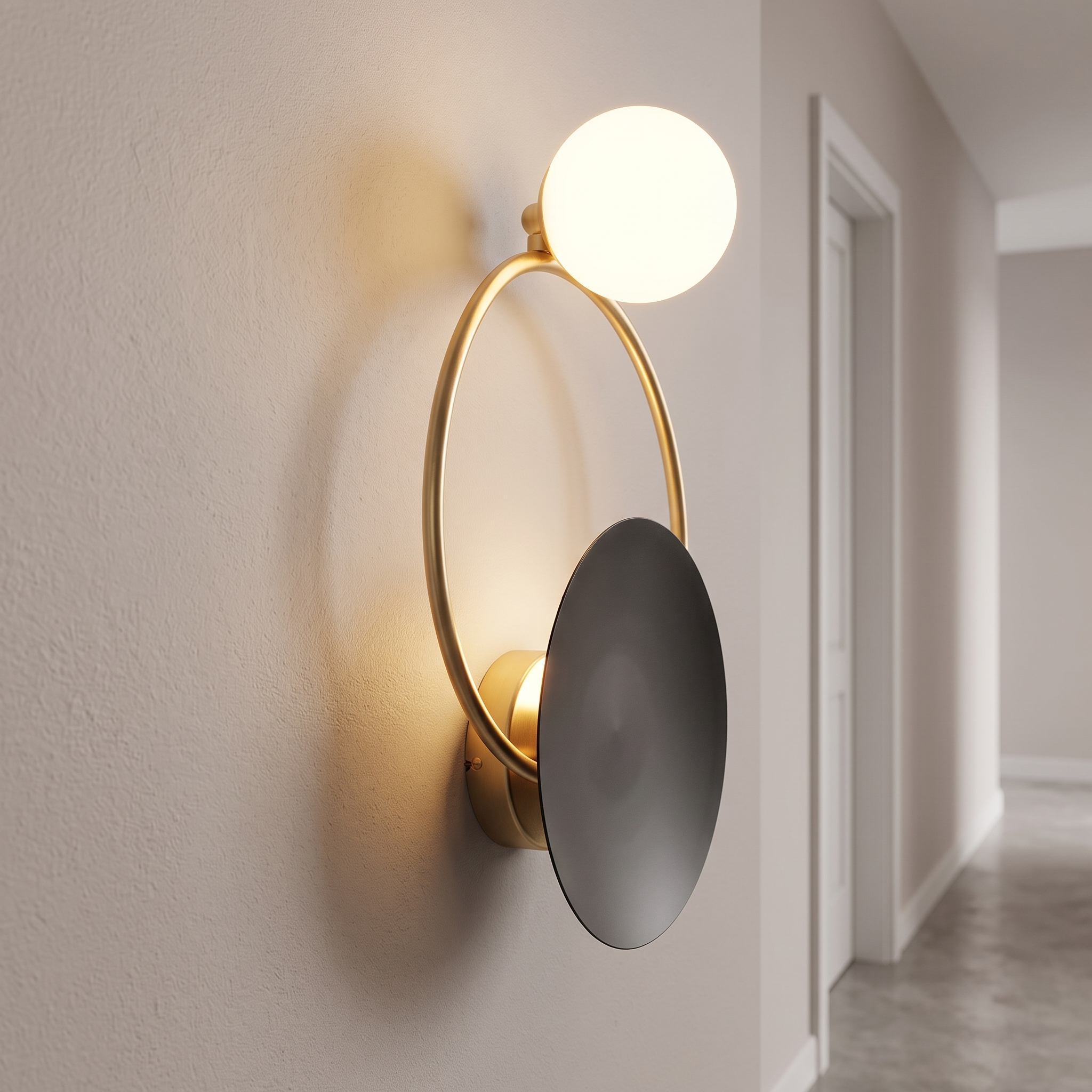 Spherical glass and metal wall lamp in a modern hallway